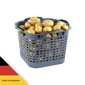 grauer Erntekorb, gefüllt mit Kartoffeln